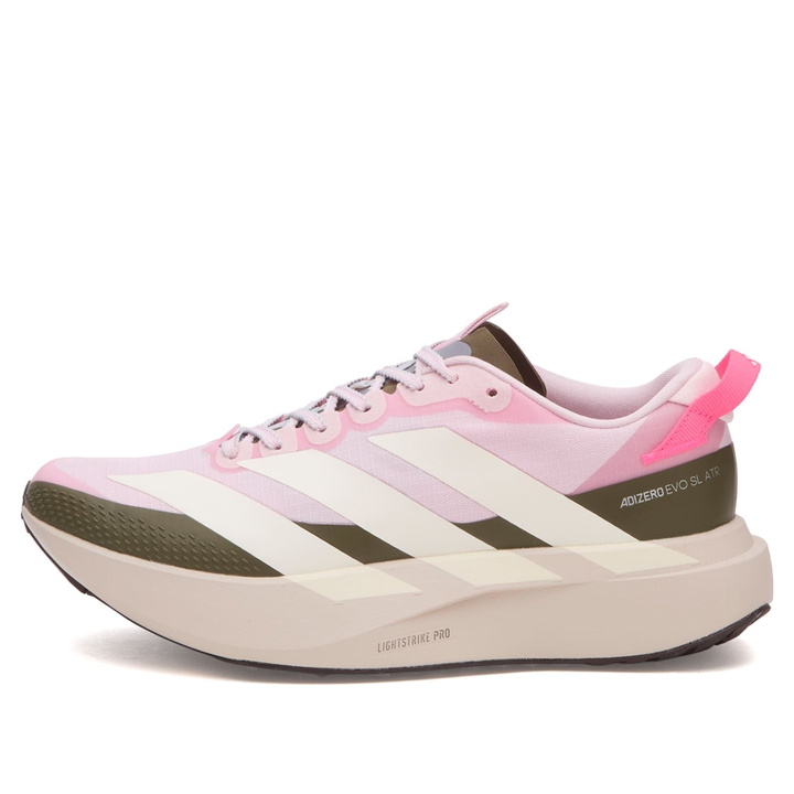 Photo: Adidas Running Women's adidas Adizero Evo Sl Atr W Sneaker in Clear Pink/Chalk White/Putty Mauve