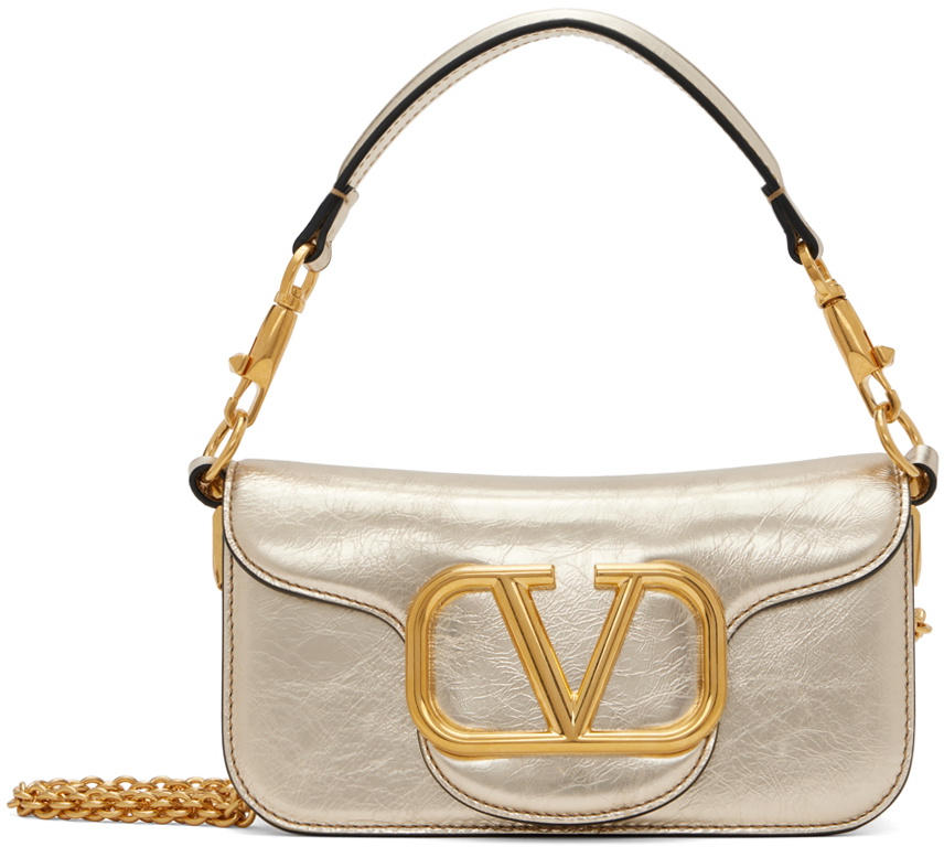 Valentino Garavani Gold Lamb Ovis Aries Aries Clutch Bag