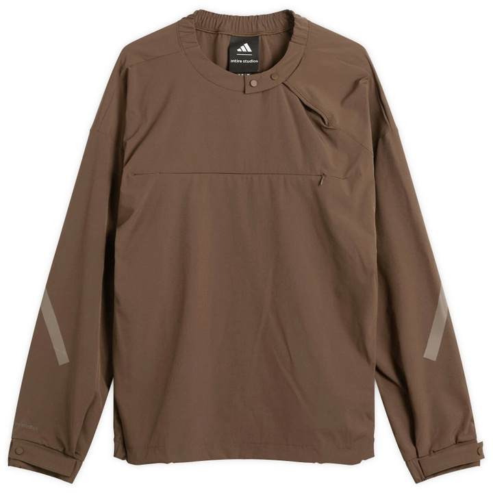 Photo: Adidas Men's x Entire Studios ZNE Half Zip Woven Sweatshirt in Dust Cargo