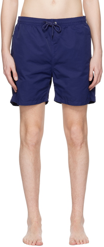 Photo: NORSE PROJECTS Navy Hauge Swim Shorts