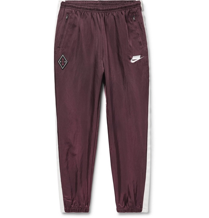 Photo: Nike - Sportswear Tapered Striped Nylon Track Pants - Burgundy