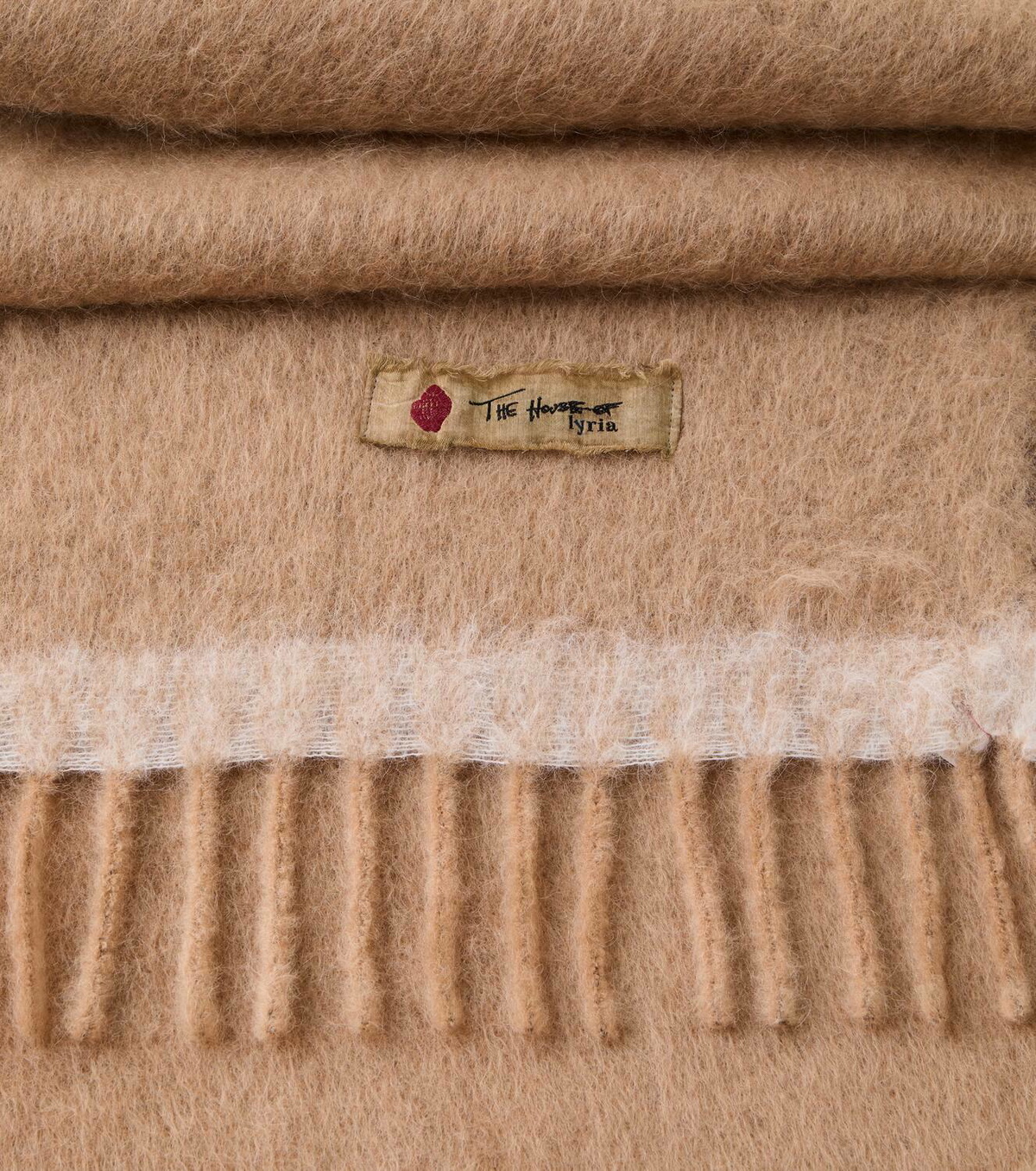 The House of Lyria Amaranto alpaca wool-blend throw