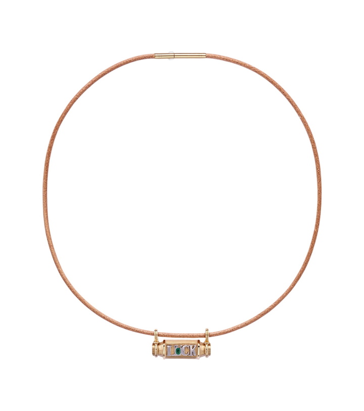 Photo: Marie Lichtenberg Luck Smash 18kt gold and leather locket necklace with emerald