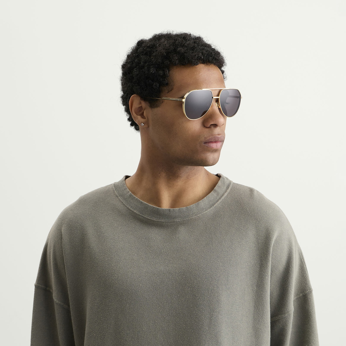 Bottega Veneta Eyewear Bottega Veneta BV1465S Sunglasses in Gold/Grey 