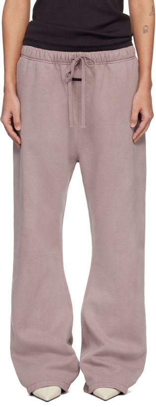 Photo: Fear of God ESSENTIALS Purple Signature Classic Fit Flare Sweatpants