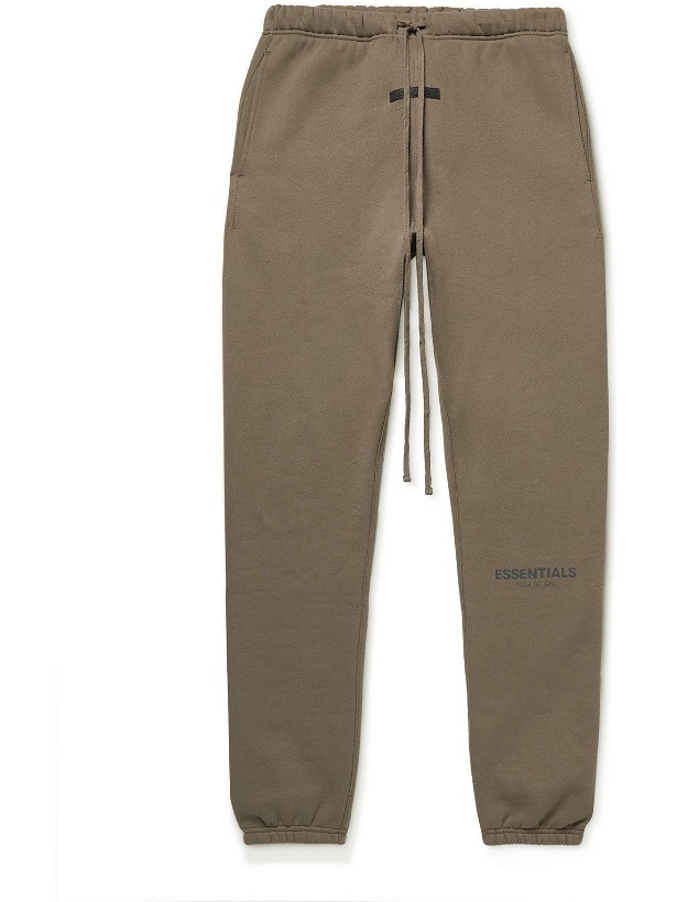 Photo: Fear of God Essentials - Tapered Logo-Print Cotton-Blend Jersey Sweatpants - Brown