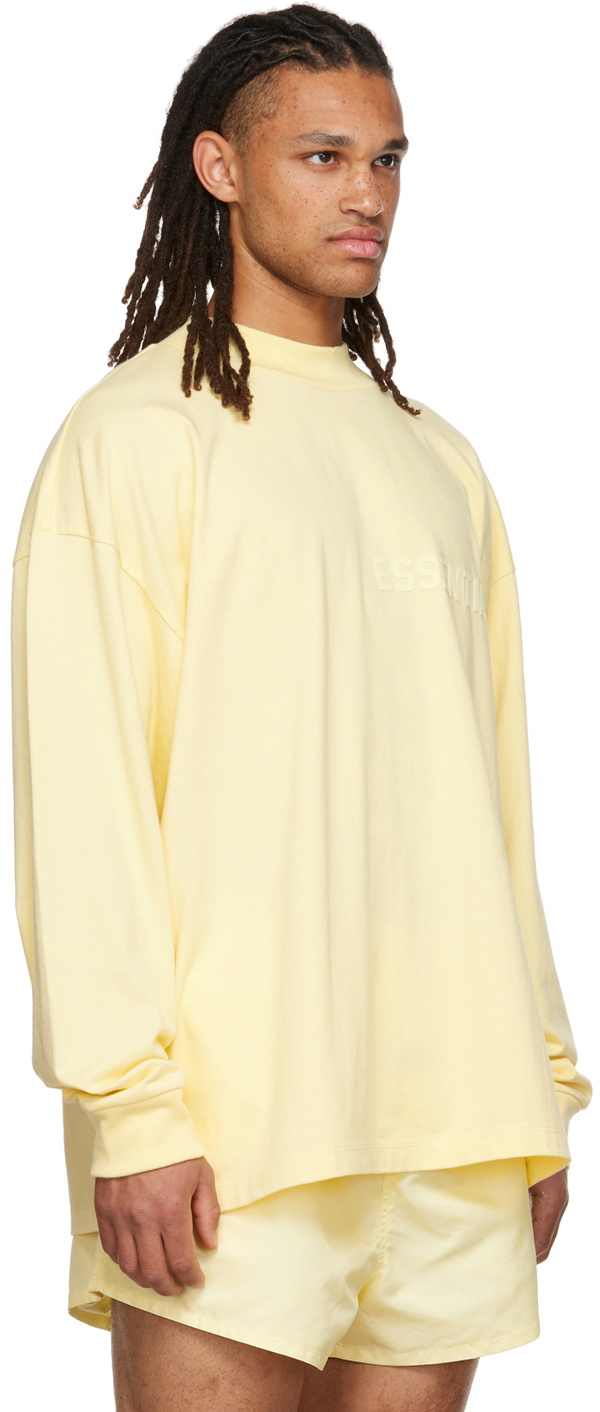 pale yellow long sleeve shirt
