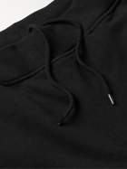C.P. Company - Tapered Logo-Embellished Cotton-Jersey Sweatpants - Black