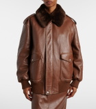 Prada Shearling-trimmed leather jacket