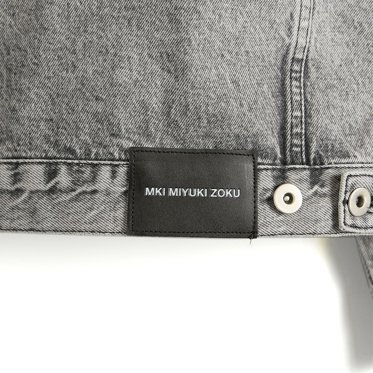 MKI Men's Denim Trucker Jacket in Washed Black