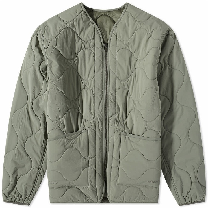 Photo: thisisneverthat Men's POLARTEC® Reversible Quilted Jacket in Sage