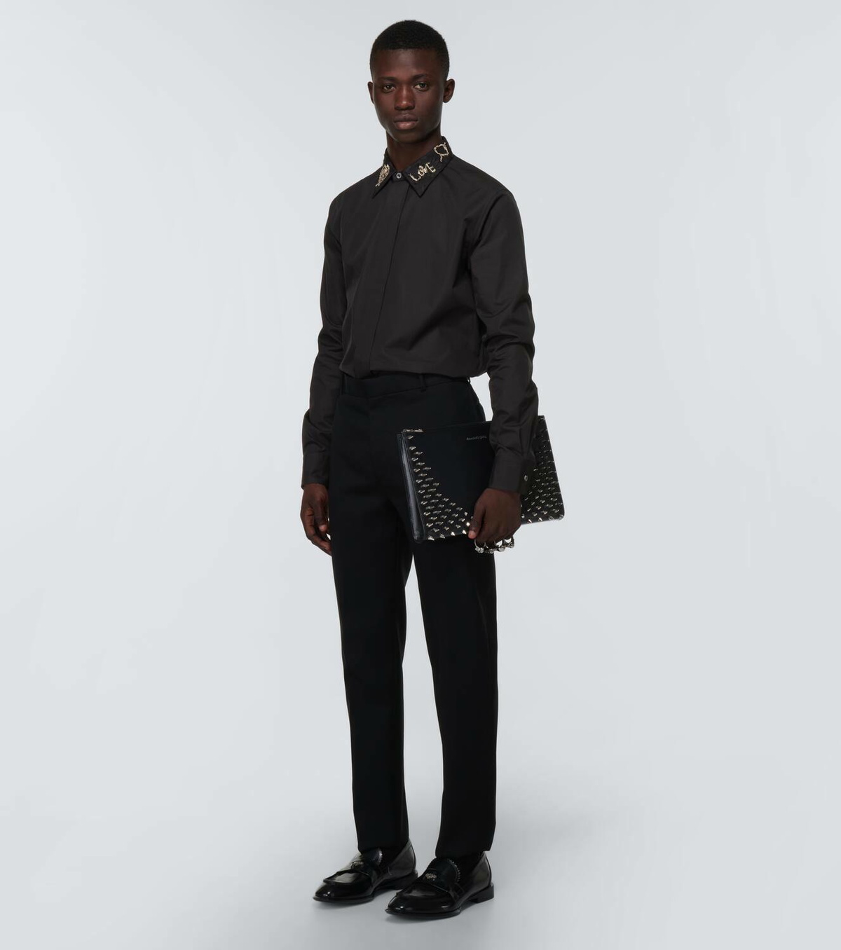 McQueen Four-Ring embellished leather clutch