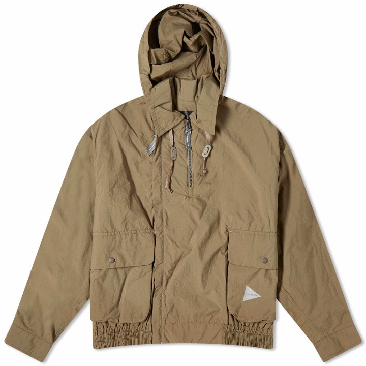 Photo: And Wander Men's Water Repellant Light Popover Jacket in Khaki