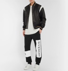 Givenchy - Tapered Logo-Print Loopback Cotton-Jersey Sweatpants - Men - Black