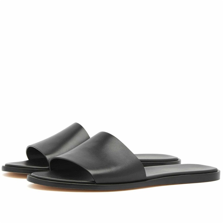 Photo: Woman by Common Projects Women's Leather Slides in Black