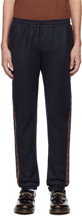 Photo: Fred Perry Navy Taped Track Pants
