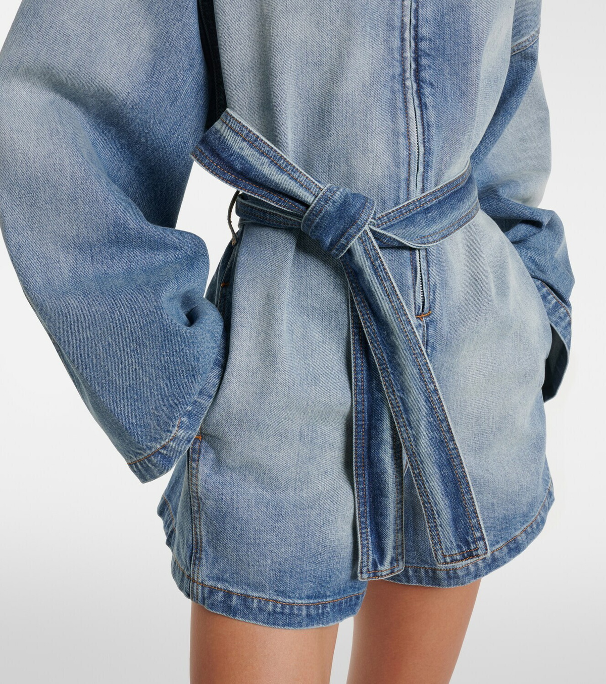 Alaïa Belted cotton denim romper