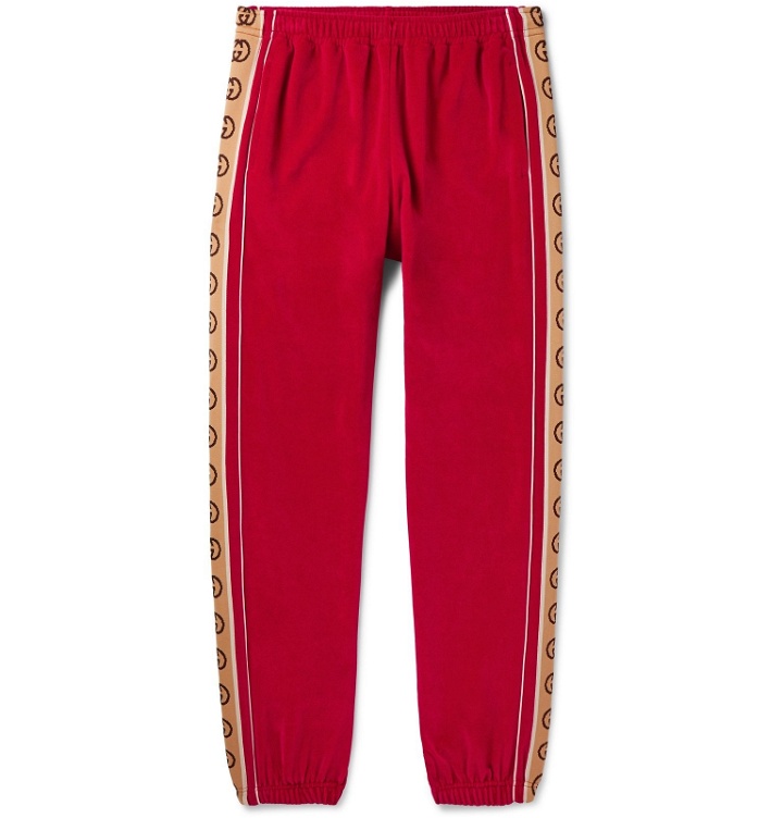 Photo: Gucci - Tapered Logo-Appliquéd Webbing-Trimmed Piped Velvet Sweatpants - Red