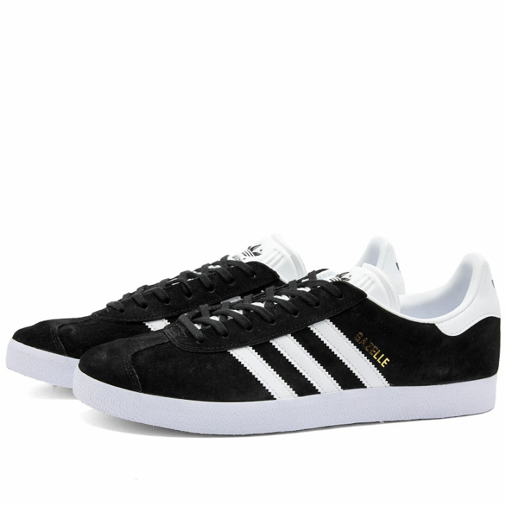Photo: Adidas Men's Gazelle Sneakers in Core Black/White/Gold Metallic