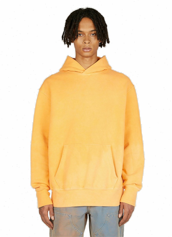 Photo: NOTSONORMAL - Splashed Hooded Sweatshirt in Orange