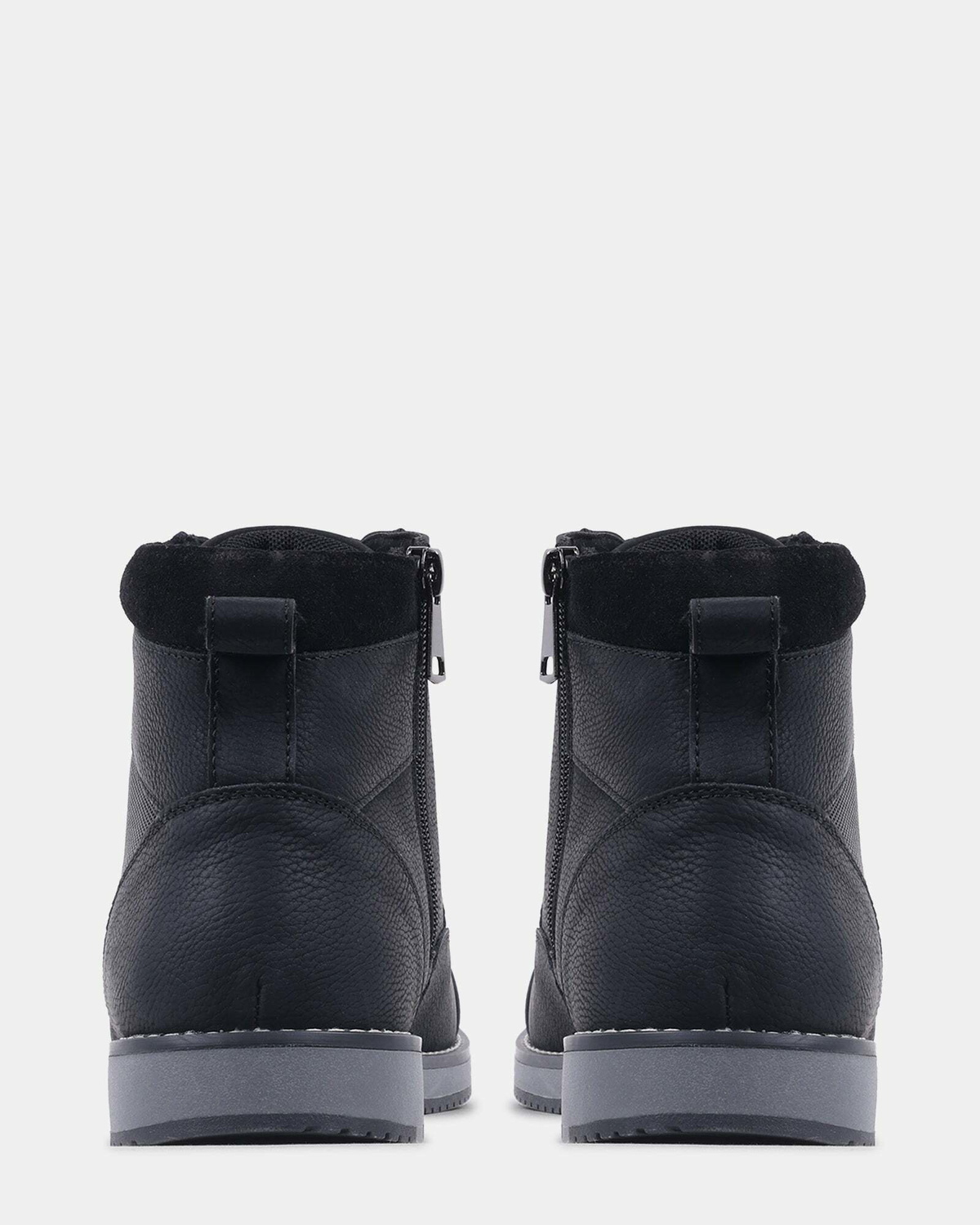Steve Madden Mentor Boots in Black