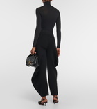 Alaïa High-rise knit barrel-leg pants