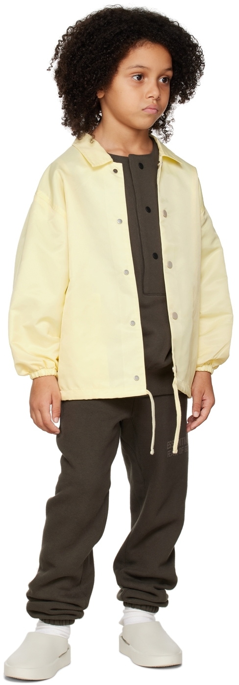 Essentials Kids Yellow '1977' Coaches Jacket Essentials