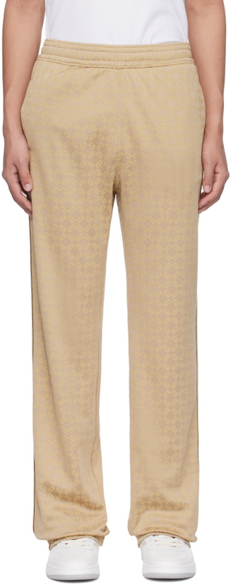 Photo: Givenchy Gold Shiny Monogram 72 Jacquard Sweatpants