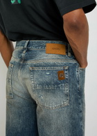 Amiri Slashed Distressed Bootcut Jeans Denim