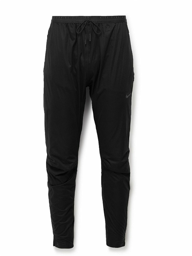 Photo: Nike Running - Slim-Fit Tapered Storm-FIT ADV Track Pants - Black