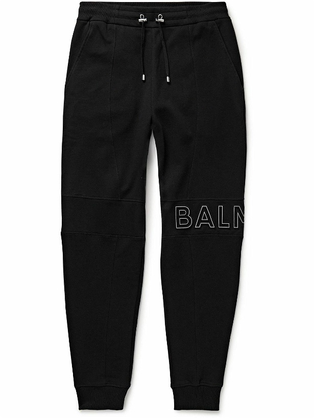 Photo: Balmain - Slim-Fit Tapered Reflective Logo-Embossed Cotton-Jersey Sweatpants - Black
