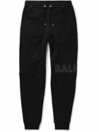 Balmain - Slim-Fit Tapered Reflective Logo-Embossed Cotton-Jersey Sweatpants - Black