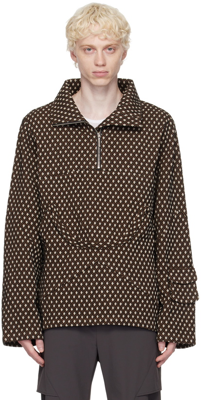 Photo: Uncertain Factor Brown Nose Guard Sweater