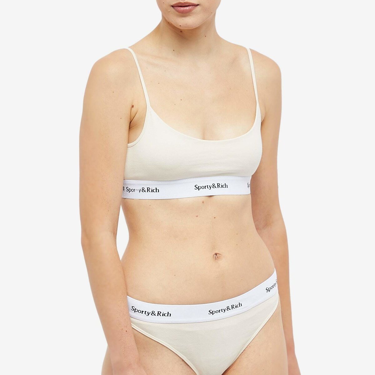 Sporty & Rich Women's Serif Logo Thong in Cream Sporty & Rich