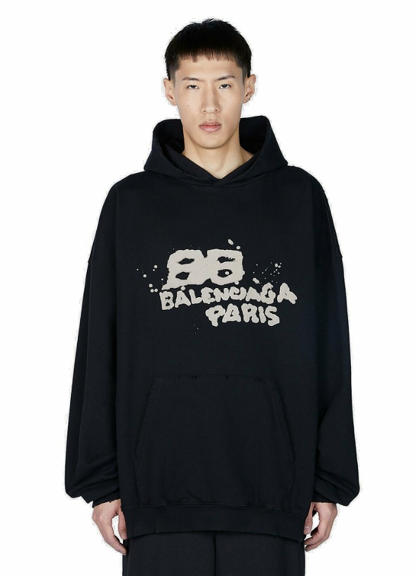 Photo: Balenciaga - Painted Logo Hooded Sweatshirt in Black