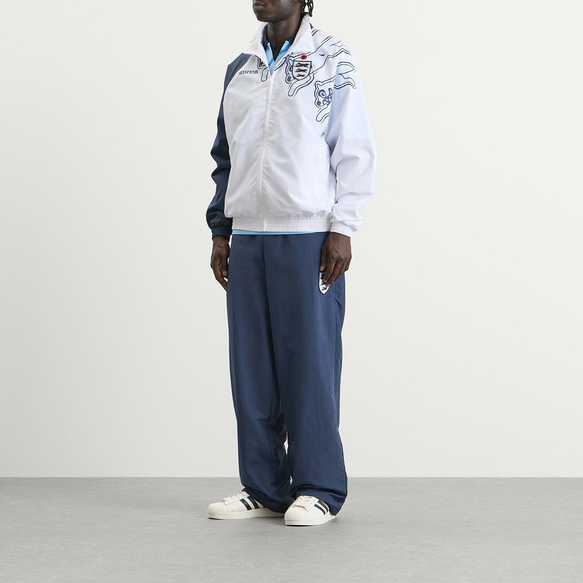 ICECREAM Men's Running Dog Patch Football Track Pants in Navy