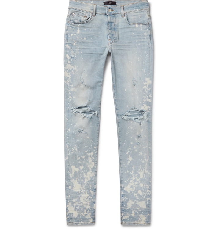 Photo: AMIRI - Thrasher Minus Skinny-Fit Paint-Splattered Distressed Stretch-Denim Jeans - Blue