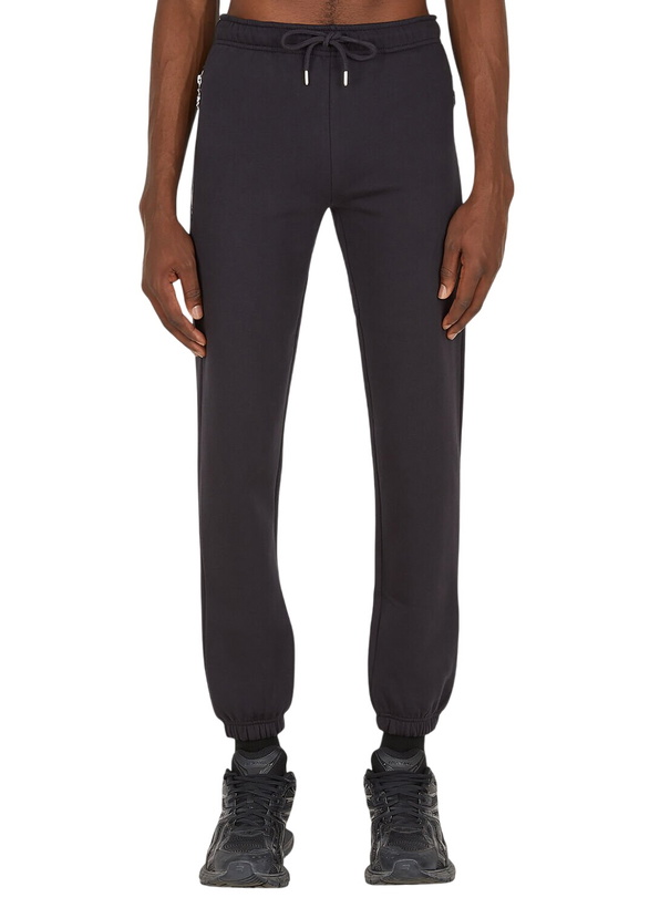 Photo: Honey Fucking Dijon Logo Print Track Pants