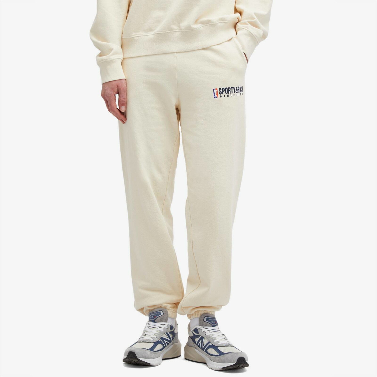 Sporty & Rich Men's Team Logo Sweat Pants in Cream/Navy