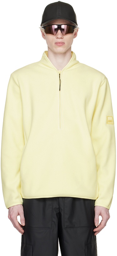 Photo: RAINS Yellow Half-Zip Sweater