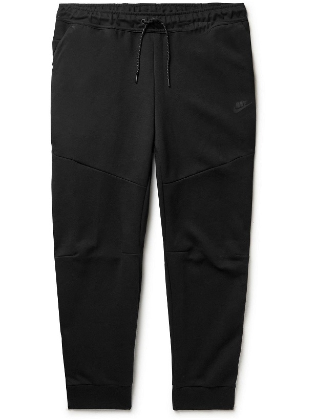 Photo: Nike - Sportswear Tapered Logo-Print Cotton-Blend Tech-Fleece Sweatpants - Black