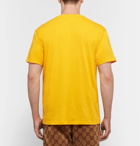 Gucci - Distressed Logo-Print Cotton-Jersey T-Shirt - Men - Marigold