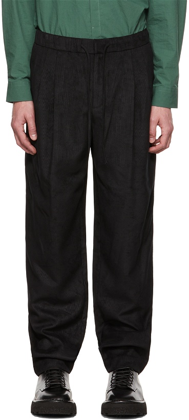 Photo: AMOMENTO Black Curved Trousers