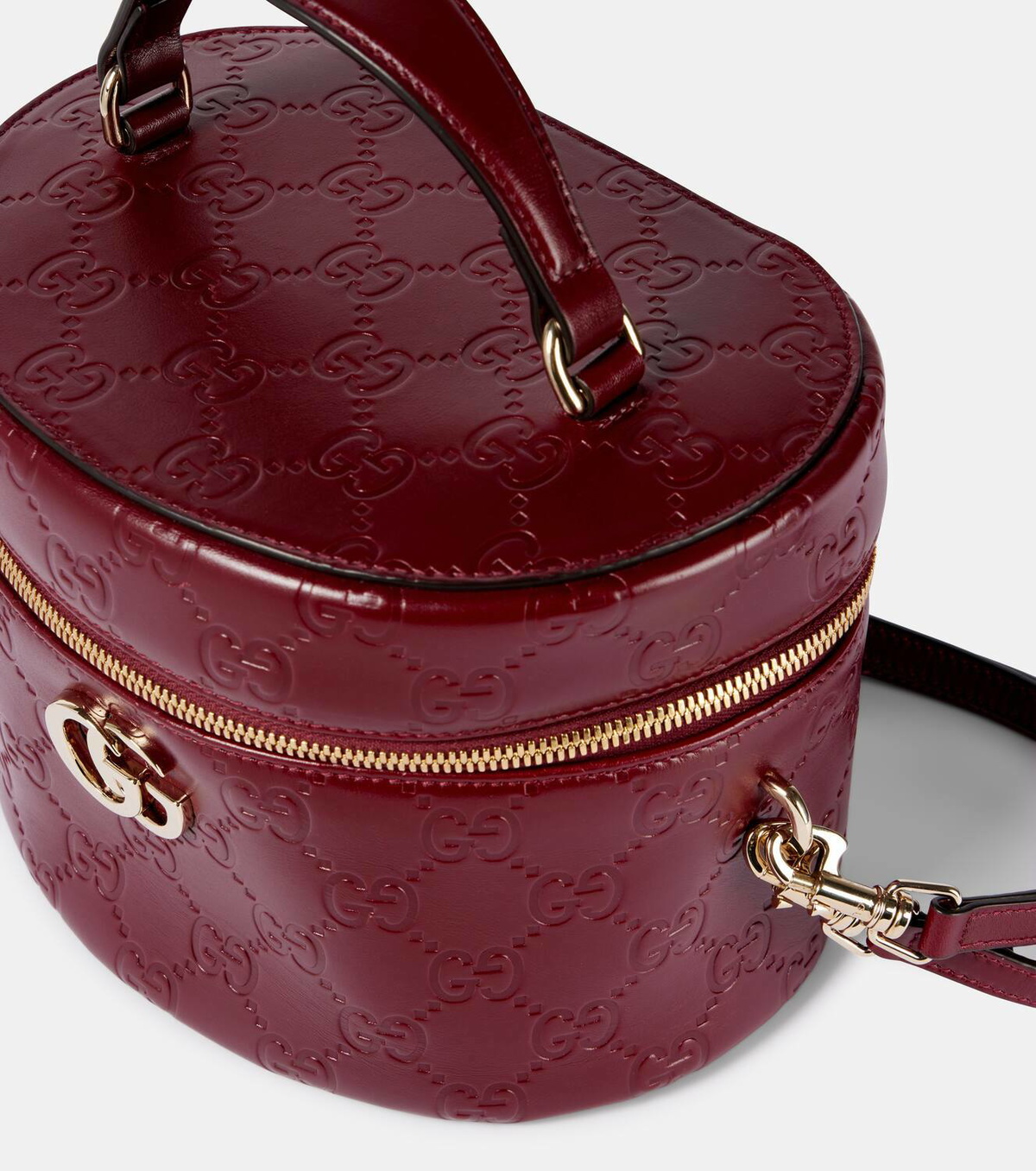 Gucci GG embossed leather vanity bag