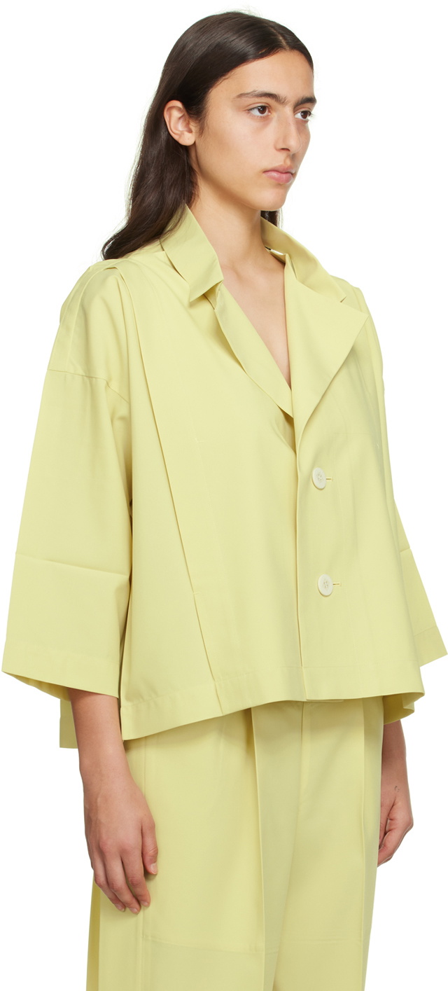 132 5. ISSEY MIYAKE Yellow Flat Tuck Jacket