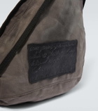 Acne Studios Sling leather-trimmed canvas backpack