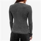 Good American Women's Jeanius Fitted Long Sleeve Henley Top in Black