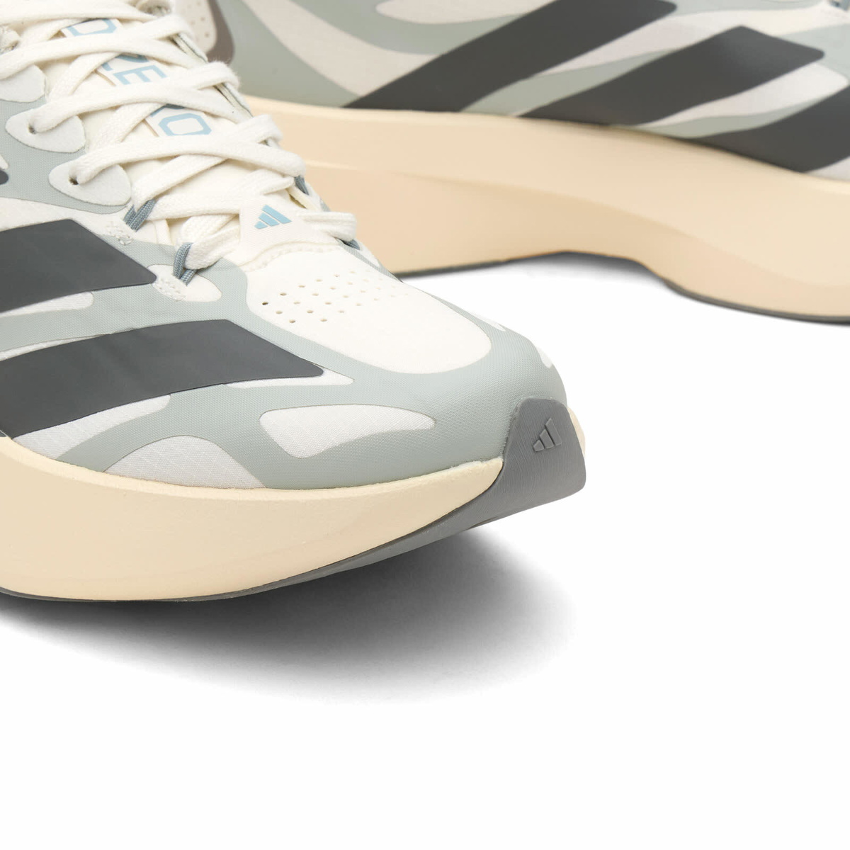 Adidas Women's Adizero Evo Sl Exo Sneaker in Cloud White/Grey Four/Wonder Silver