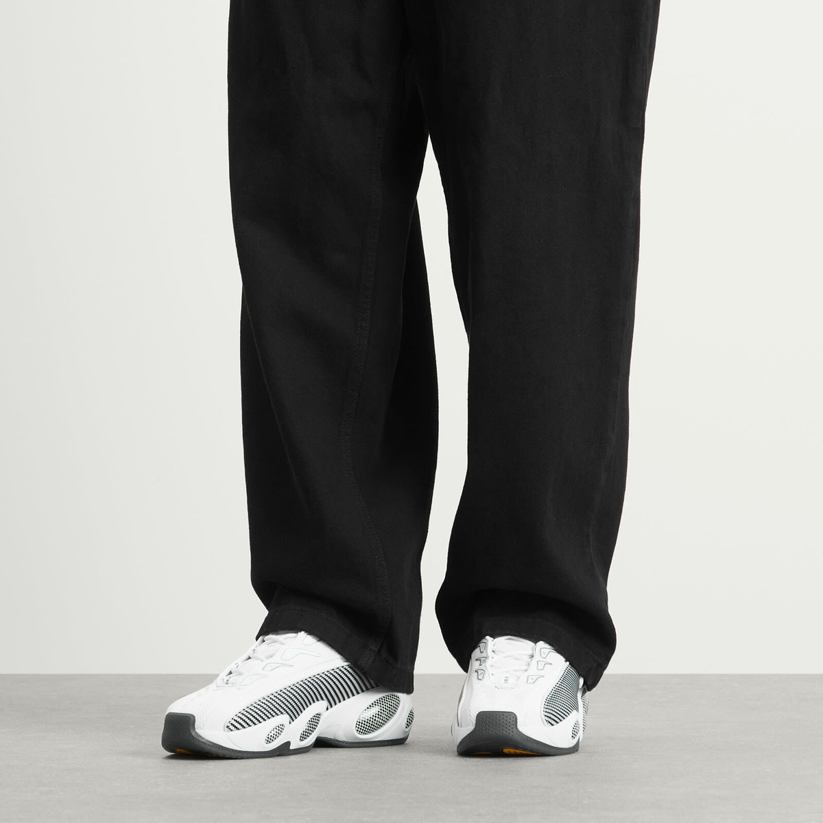 Nike Nocta Glide Sneaker in White/Black/Gold
