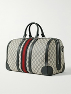 GUCCI - Leather- and Webbing-Trimmed Monogrammed Supreme Coated-Canvas Duffle Bag